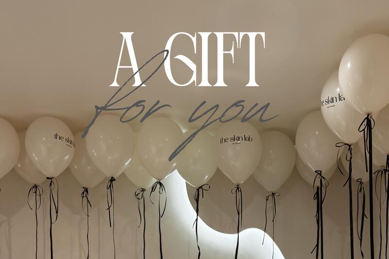 The Skin Lab gift card: ‘A gift for you’ over the studio’s balloon wall